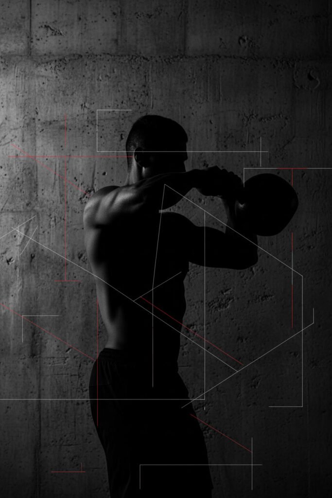 man performing kettlebell swing
